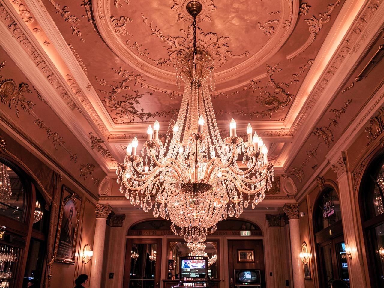 Chandelier and decorated ceiling inside Sophia's Casino